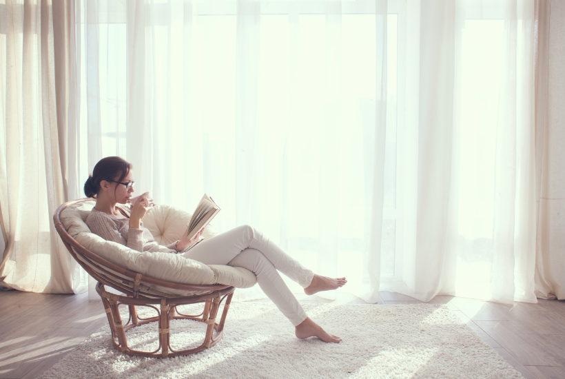 Woman relaxing in a chair - rest and relaxation tips by Marva Smith.